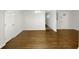 Open-concept space featuring gorgeous wood floors and a spacious layout perfect for entertaining guests at 1879 Shamrock Dr, Decatur, GA 30032