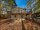 Exterior rear elevation showing deck and walkout basement at 4425 Amy Rd, Snellville, GA 30039