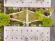 Aerial view of condo buildings with manicured landscaping and courtyard at 5200 Peachtree Rd # 2116, Atlanta, GA 30341