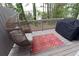 Cozy deck featuring a comfortable egg chair and a grill, perfect for outdoor relaxation and entertainment at 1494 Addison Pl, Decatur, GA 30033