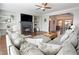 Comfortable living room area with modern decor, a fireplace, and a sectional sofa perfect for entertaining at 1494 Addison Pl, Decatur, GA 30033