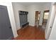 Welcoming mudroom with hardwood floors, coat rack, and convenient storage cubbies, offering both style and functionality at 1494 Addison Pl, Decatur, GA 30033