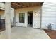 Outdoor patio featuring white siding and a concrete area perfect for outdoor seating and relaxation at 1494 Addison Pl, Decatur, GA 30033