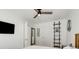 This bedroom features hardwood floors, a ceiling fan and great natural light at 2007 Glenwood Se Ave, Atlanta, GA 30316