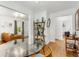 Open concept to the living room and kitchen, this dining room features hardwood floors and abundant natural light at 2007 Glenwood Se Ave, Atlanta, GA 30316