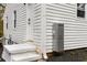 Exterior side view of home featuring a modern tankless hot water heater at 2007 Glenwood Se Ave, Atlanta, GA 30316