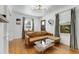 Cozy living room with ample natural light, stylish furnishings, and hardwood floors at 2007 Glenwood Se Ave, Atlanta, GA 30316