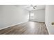 Bedroom with gray walls, hardwood floors, and a window at 210 Millpond Pkwy, Villa Rica, GA 30180