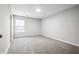 Bedroom featuring neutral carpet and natural light from a window at 210 Millpond Pkwy, Villa Rica, GA 30180