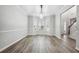 Dining room with large window, hardwood floors, and gray walls at 210 Millpond Pkwy, Villa Rica, GA 30180