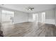 Open concept living room with hardwood floors and gray walls at 210 Millpond Pkwy, Villa Rica, GA 30180