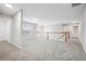Upstairs loft area with neutral carpet and natural light at 210 Millpond Pkwy, Villa Rica, GA 30180