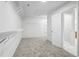 Well-organized walk-in closet with wire shelving and easy access from the main bathroom at 210 Millpond Pkwy, Villa Rica, GA 30180