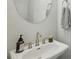 Clean, modern bathroom with a vanity, mirror, and sink at 2420 Lakeshore Se Ln, Atlanta, GA 30316