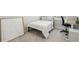 Simple bedroom with a bed, desk, and carpet at 2420 Lakeshore Se Ln, Atlanta, GA 30316