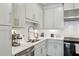 Close-up of the modern kitchen with stainless steel appliances and white backsplash at 2420 Lakeshore Se Ln, Atlanta, GA 30316