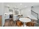 Open concept modern kitchen with an island, stainless steel appliances and sleek finishes at 2420 Lakeshore Se Ln, Atlanta, GA 30316