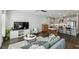 Open-concept living area with modern kitchen and comfortable seating arrangement at 2420 Lakeshore Se Ln, Atlanta, GA 30316