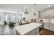 Bright, open-concept living room and kitchen area with modern finishes and stainless steel appliances at 2420 Lakeshore Se Ln, Atlanta, GA 30316