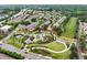 Picturesque aerial view showcasing the neighborhood's park with playground and recreational areas at 4934 Wyeth Way, Johns Creek, GA 30022