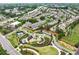 Scenic aerial view of a neighborhood park with playground, walking trails, and picnic areas at 4934 Wyeth Way, Johns Creek, GA 30022