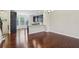Open floor plan features a sunlit kitchen with a breakfast bar that overlooks the living room at 4934 Wyeth Way, Johns Creek, GA 30022