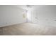 Bedroom with neutral carpet, natural light from the window, and fresh white walls at 5578 Hedge Brooke Dr, Acworth, GA 30101