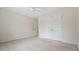 Bedroom featuring neutral carpet, double door closet, and fresh white paint at 5578 Hedge Brooke Dr, Acworth, GA 30101