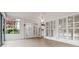 Enclosed sunroom with tile floors and large windows offering pleasant backyard views at 5578 Hedge Brooke Dr, Acworth, GA 30101