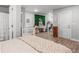 A bedroom and Bedroom area with wood-look floors and a decorative plant wall at 5135 Arnold St, Covington, GA 30014