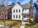 Charming two-story home with inviting front porch and well-maintained lawn and craftsman style design at 5135 Arnold St, Covington, GA 30014