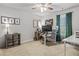 A well-lit office space with hardwood floors and dual workspaces at 5135 Arnold St, Covington, GA 30014