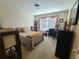 Cozy bedroom with carpet floors, large window, and neutral walls at 828 Cooper Lakes Ct, Grayson, GA 30017