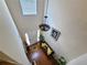 Bright foyer with hardwood floors, a decorative chandelier, and an upper-level view at 828 Cooper Lakes Ct, Grayson, GA 30017