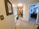 Upper hallway featuring an arched opening with office view at 828 Cooper Lakes Ct, Grayson, GA 30017
