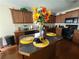 Spacious kitchen featuring an island with granite countertop and wooden cabinets at 828 Cooper Lakes Ct, Grayson, GA 30017