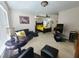 Spacious main bedroom boasts ceiling fan and comfortable sitting area at 828 Cooper Lakes Ct, Grayson, GA 30017