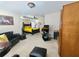 Spacious main bedroom boasts ceiling fan and comfortable sitting area at 828 Cooper Lakes Ct, Grayson, GA 30017