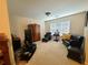 Comfortable sitting area features large window and cozy decor at 828 Cooper Lakes Ct, Grayson, GA 30017