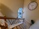 Carpeted staircase with white railings, leading to the next level of the home at 828 Cooper Lakes Ct, Grayson, GA 30017