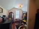 A tidy walk-in closet boasts wood floors, a light fixture, and ample storage at 828 Cooper Lakes Ct, Grayson, GA 30017