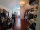 Spacious walk-in closet with wood floors, clothing racks, and storage solutions at 828 Cooper Lakes Ct, Grayson, GA 30017
