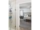 Stylish walk-in shower with tile surround, glass doors, and a view into the bedroom at 139 Rushing View Gln, Dallas, GA 30157