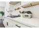 Close-up of kitchen featuring gas cooktop, decorative tile backsplash, quartz countertops at 139 Rushing View Gln, Dallas, GA 30157
