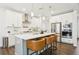 Modern kitchen with a white countertop island, stainless steel appliances, and pendant lighting at 139 Rushing View Gln, Dallas, GA 30157