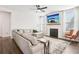 Bright living room with a fireplace, large sectional sofa, ceiling fan, and a flat screen television at 139 Rushing View Gln, Dallas, GA 30157