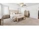 Main bedroom features neutral carpet, ceiling fan and natural light at 139 Rushing View Gln, Dallas, GA 30157