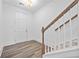Bright foyer with vinyl wood flooring, white walls, and natural light near the front door at 1516 Parks Edge Nw Ln, Atlanta, GA 30318