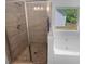 Contemporary bathroom with a tiled shower, garden tub, and natural light at 280 Mcgiboney Ln, Covington, GA 30016