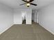Bright, carpeted bedroom with a ceiling fan and neutral paint, awaiting personalization at 280 Mcgiboney Ln, Covington, GA 30016